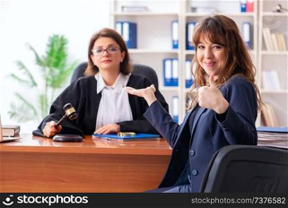 Young woman visiting female lawyer 