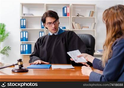 Young woman visiting male lawyer 