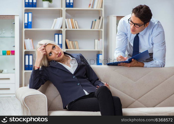 Young woman visiting psychiatrist man doctor for consultation