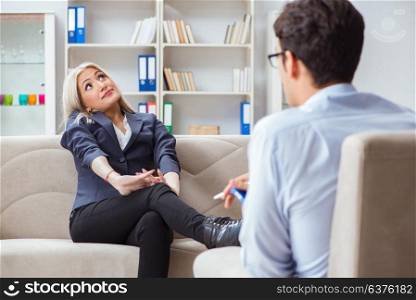 Young woman visiting psychiatrist man doctor for consultation