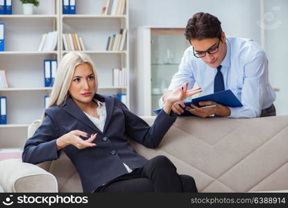 Young woman visiting psychiatrist man doctor for consultation