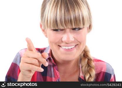Young woman wagging her finger in a lighthearted manner