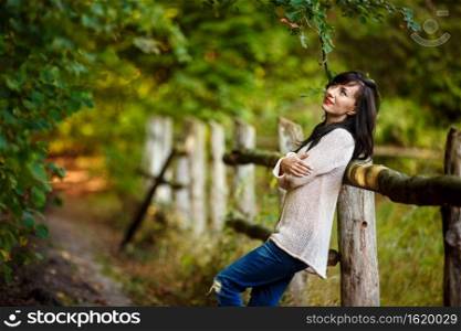 Young woman walking in the park, forest.. Young woman walking in the park, forest