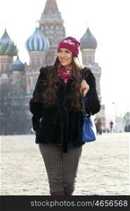 Young woman walking on the Red Square in Moscow
