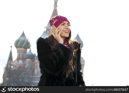 Young woman walking on the Red Square in Moscow