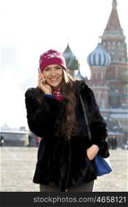 Young woman walking on the Red Square in Moscow