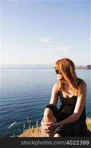Young woman watching sea