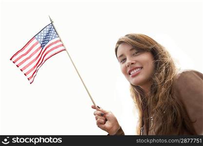 Young Woman Waving American Flag