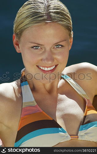 Young woman wearing bikini outdoors portrait