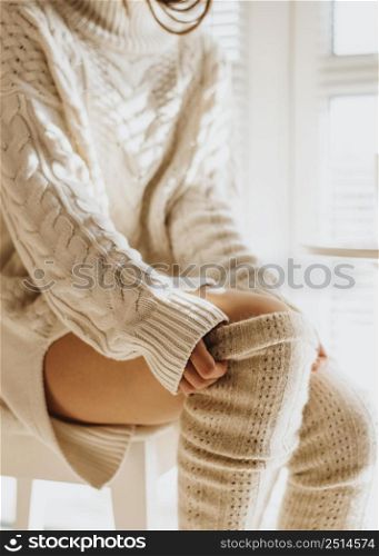 young woman wearing cozy winter clothes 2