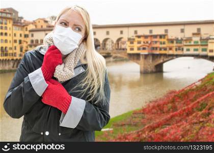 Young Woman Wearing Face Mask Walks the Streets In Tuscany, Florence, Italy.