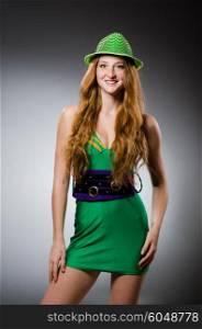 Young woman wearing green dress