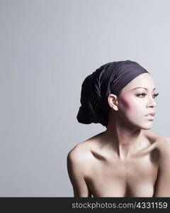 Young woman wearing head tie