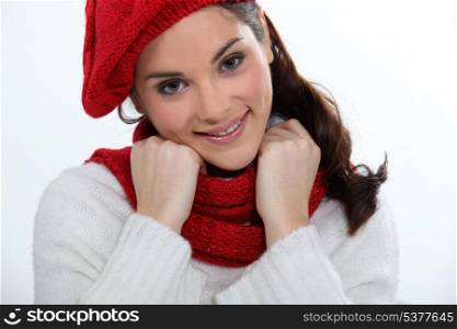 young woman wearing scarf and bonnet
