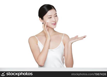 Young woman wearing skin care products