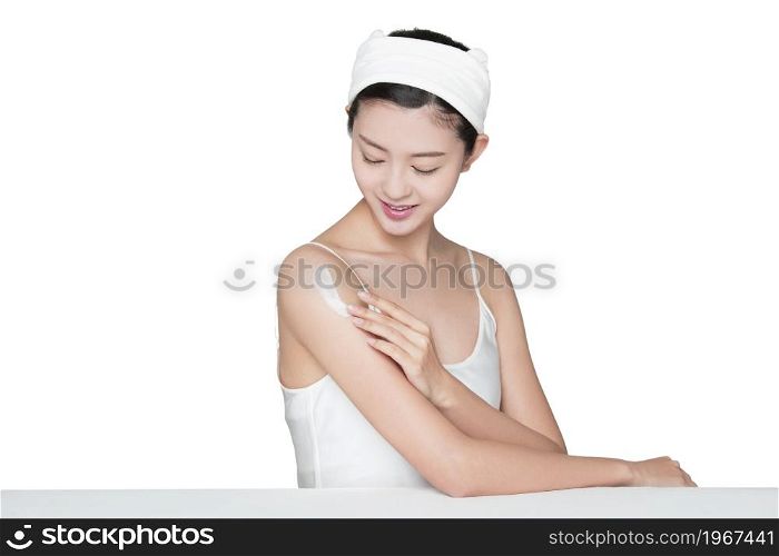 Young woman wearing skin care products