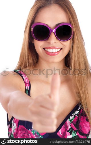 Young woman wearing violet framed sunglass and showing her thumbs up over white background