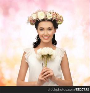 young woman wearing wreath of flowers and bouquet