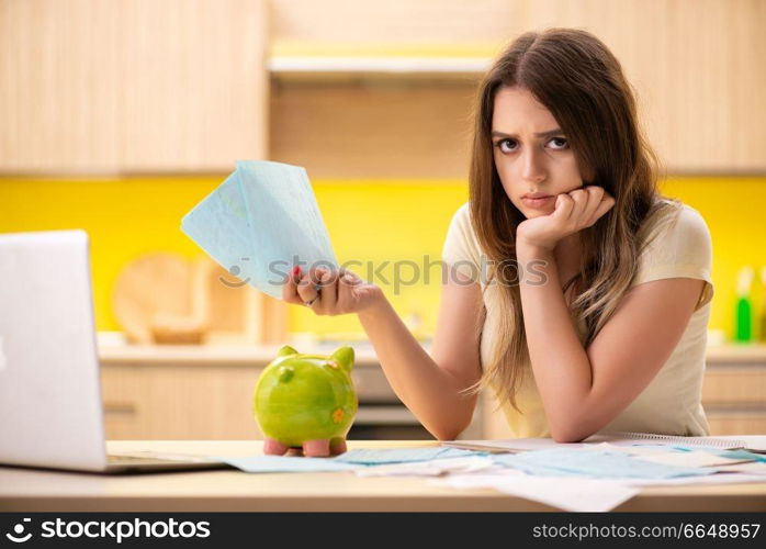 Young woman wife in budget planning concept