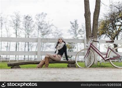 Young woman with a bicycle