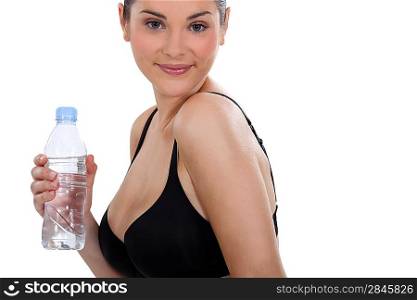 Young woman with a bottle of water