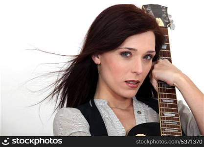 Young woman with a guitar