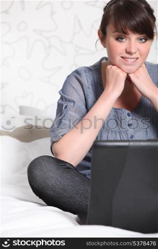 Young woman with a laptop computer