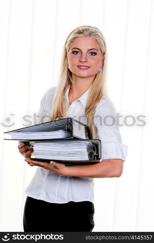 young woman with a stack of files folder: