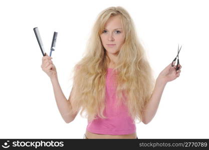 young woman with backcombing hair and scissors. Isolated on white background