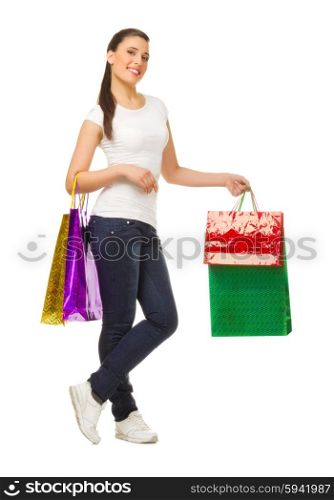 Young woman with bags isolated