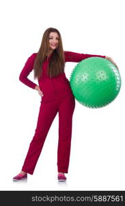 Young woman with ball exercising on white