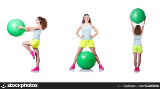 Young woman with ball exercising on white