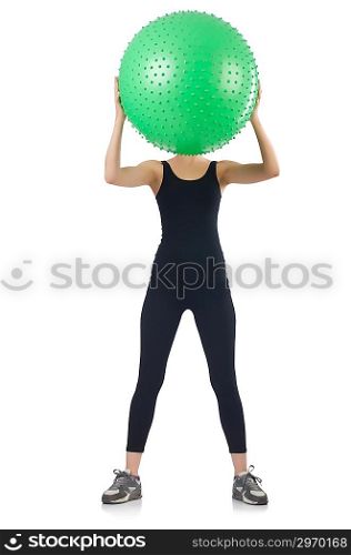 Young woman with ball exercising on whitee