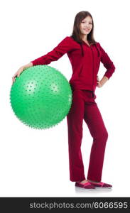 Young woman with ball exercising on whitee