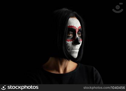 young woman with black short hair in white makeup Sugar head to the day of the dead, black background