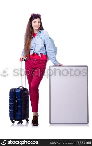 Young woman with blank message and suitcase