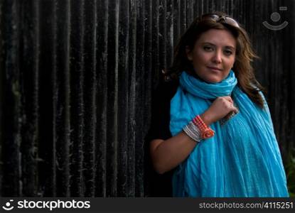 Young woman with blue scarf