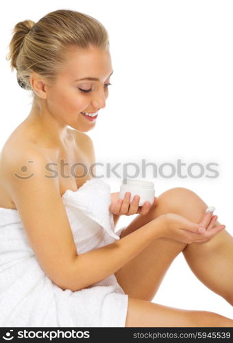 Young woman with body cream isolated