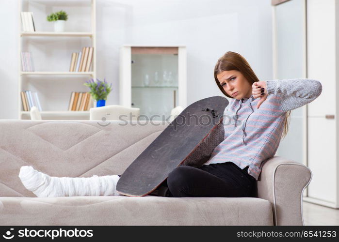 Young woman with broken leg at home