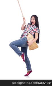 Young woman with broom isolated on white