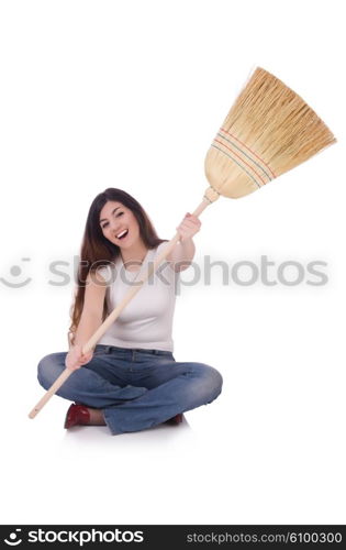 Young woman with broom isolated on white