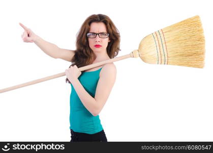 Young woman with broom on white