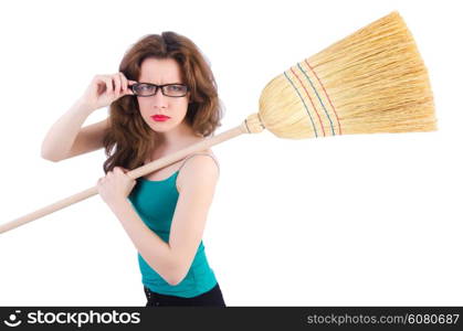 Young woman with broom on white