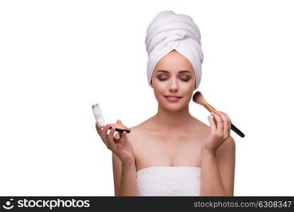 Young woman with brush isolated on white