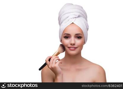 Young woman with brush isolated on white