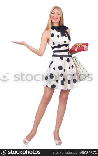 Young woman with christmas shopping on white