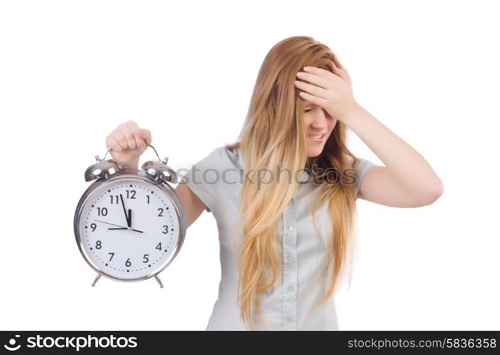 Young woman with clock on white