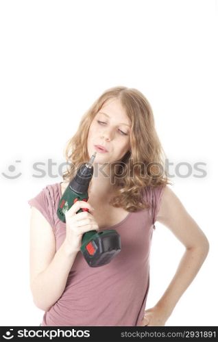 young woman with electric drill against white background