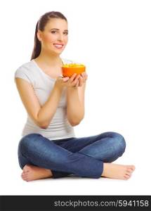 Young woman with fruit salad isolated