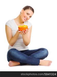Young woman with fruit salad isolated
